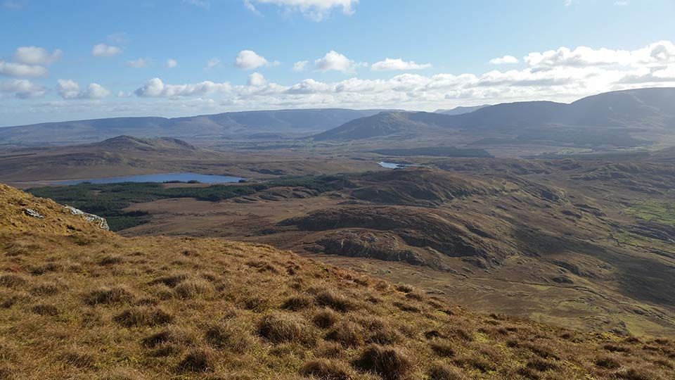 Looking southeast from the Reek, towards the Partry Mountains, with Lough na Corra in the foreground
